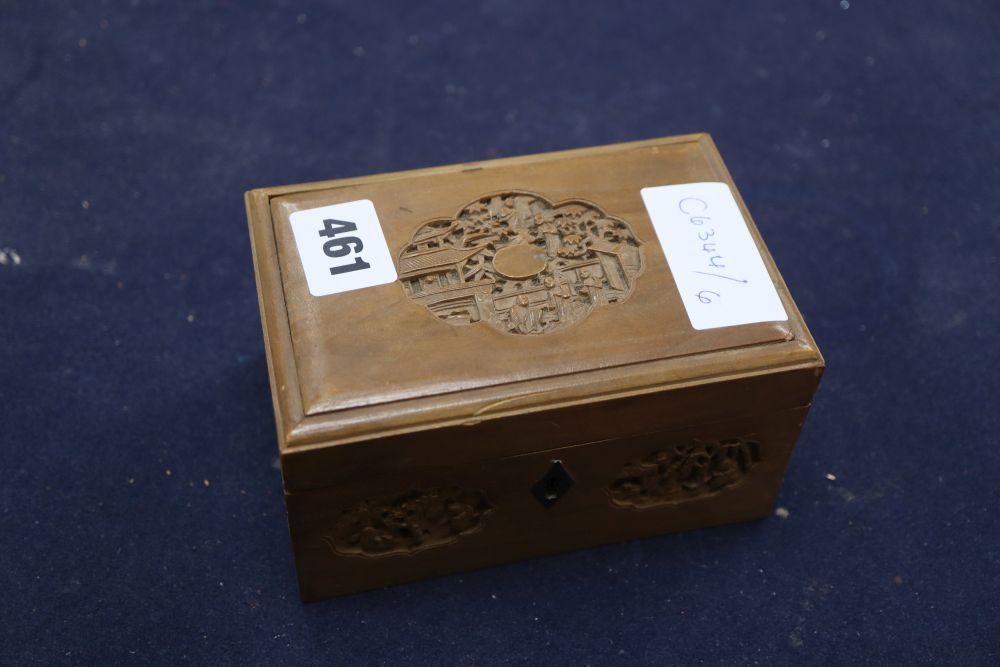 A collection of mother of pearl gaming counters in a Chinese carved box